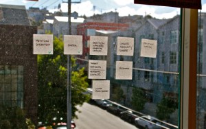 Remnants of a brainstorm on a dusty window at Change.org's San Francisco office. 