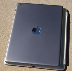 Just a bit smaller than an iPad 4