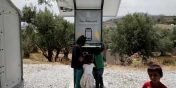 Solar-powered phone charger gives migrants in Greece free electricity