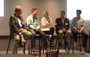 This photo shows VentureBeat's Blaise Zerega, Bombora's Rob Armstrong, Capstak's. Heather Goldman, EDAWN's Mike Kazmierski, and TrainerRoad's Nate Pearson onstage at the VentureBeat Heartland Tech and Blueprint kickoff event in San Francisco on June 14, 2017.
