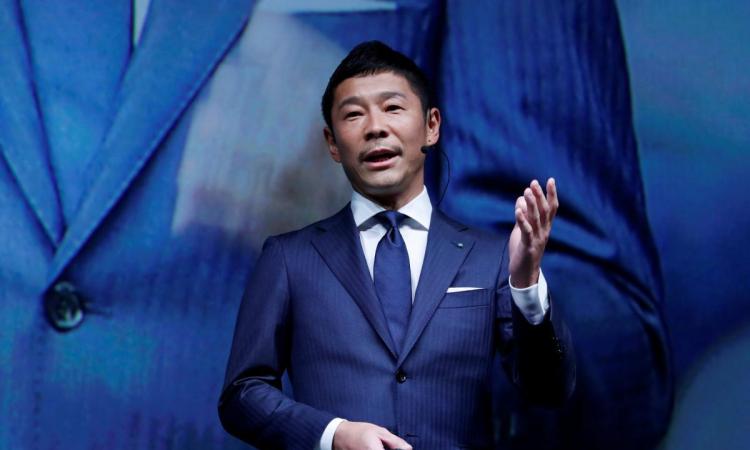 Yusaku Maezawa, the chief executive of Zozo, which operates Japan's popular fashion shopping site Zozotown and is officially called Start Today Co, speaks at an event launching the debut of its formal apparel items, in Tokyo, Japan, July 3, 2018.
