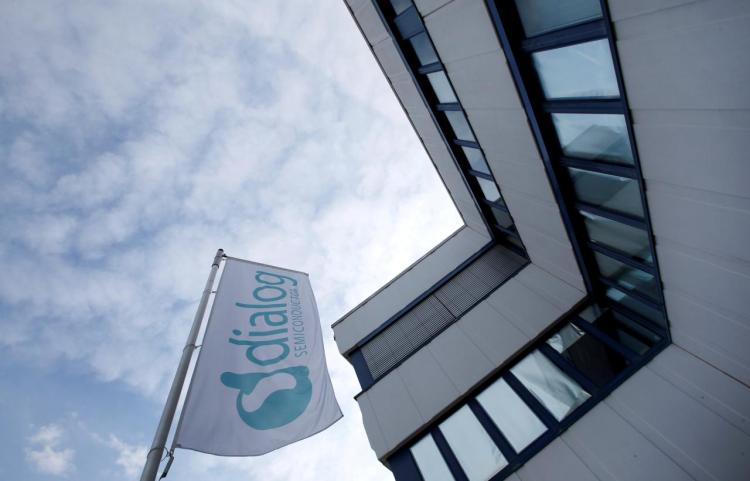 Dialog semiconductor logo is pictured at a flag in Germering near Munich, Germany August 15, 2016. 