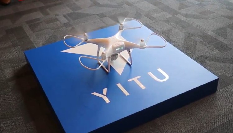 A still shot from Yitu's Singapore expansion announcement video. The company is showing off AI identity-recognition via drone.