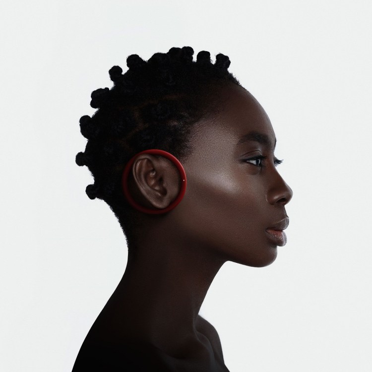 Frog's wireless earpod lets you hear ambient noises as you listen to your speakers.