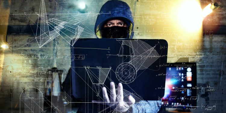 dangerous hacker stealing data -industrial espionage concept